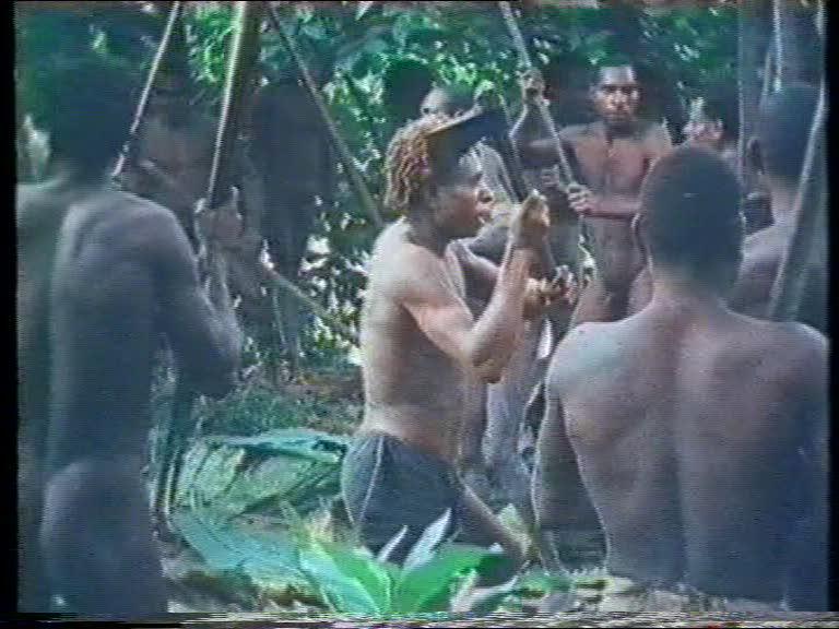 FI/1200/55 - 
Matjemosh: A woodcarver from the village of Amanamka, Asmat tribe, on the Southern West coast of New Guinea
