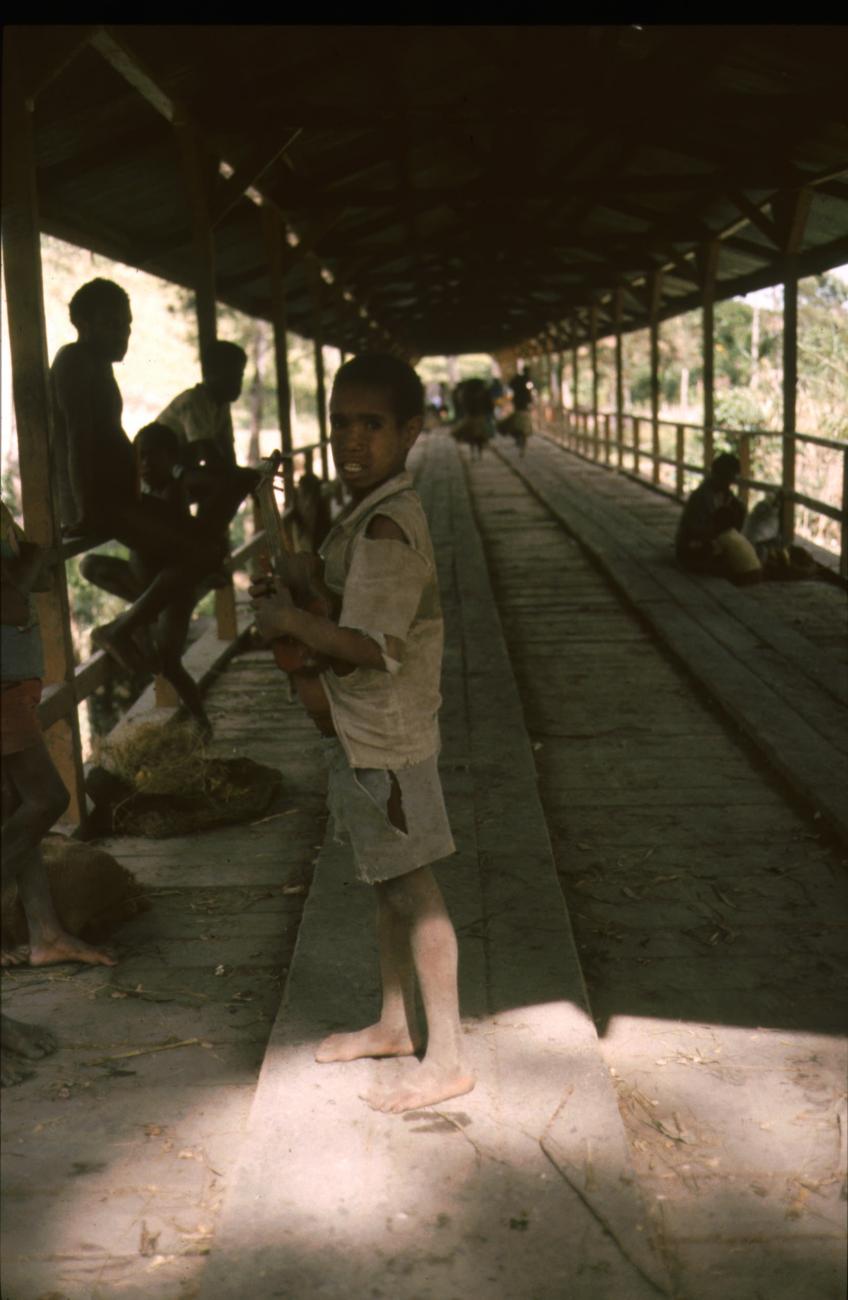 BD/166/218 -
Boy on a roofed bridge
