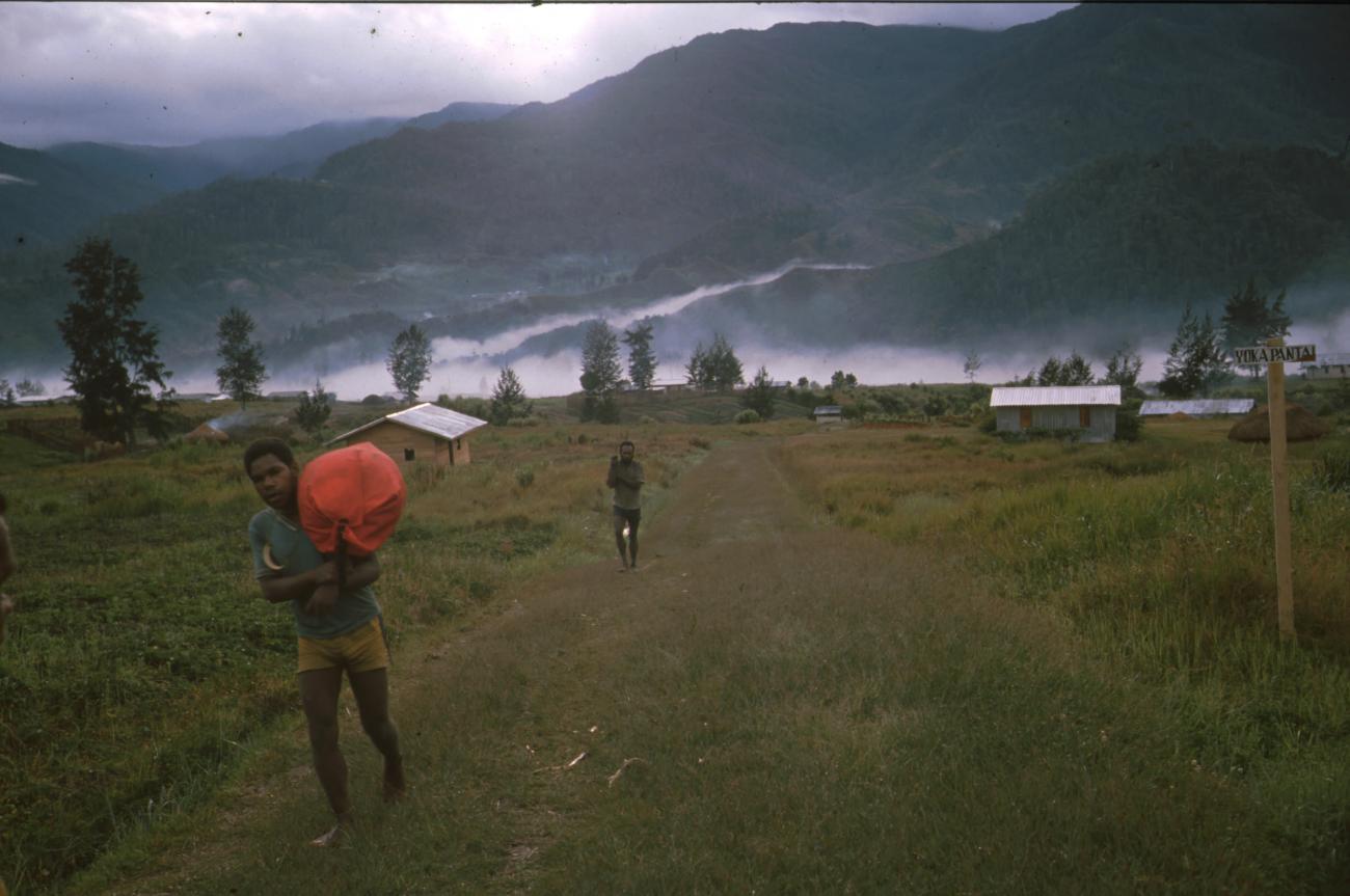 BD/166/320 -
On the road in the mountains (sign says 'Yoka pantal')