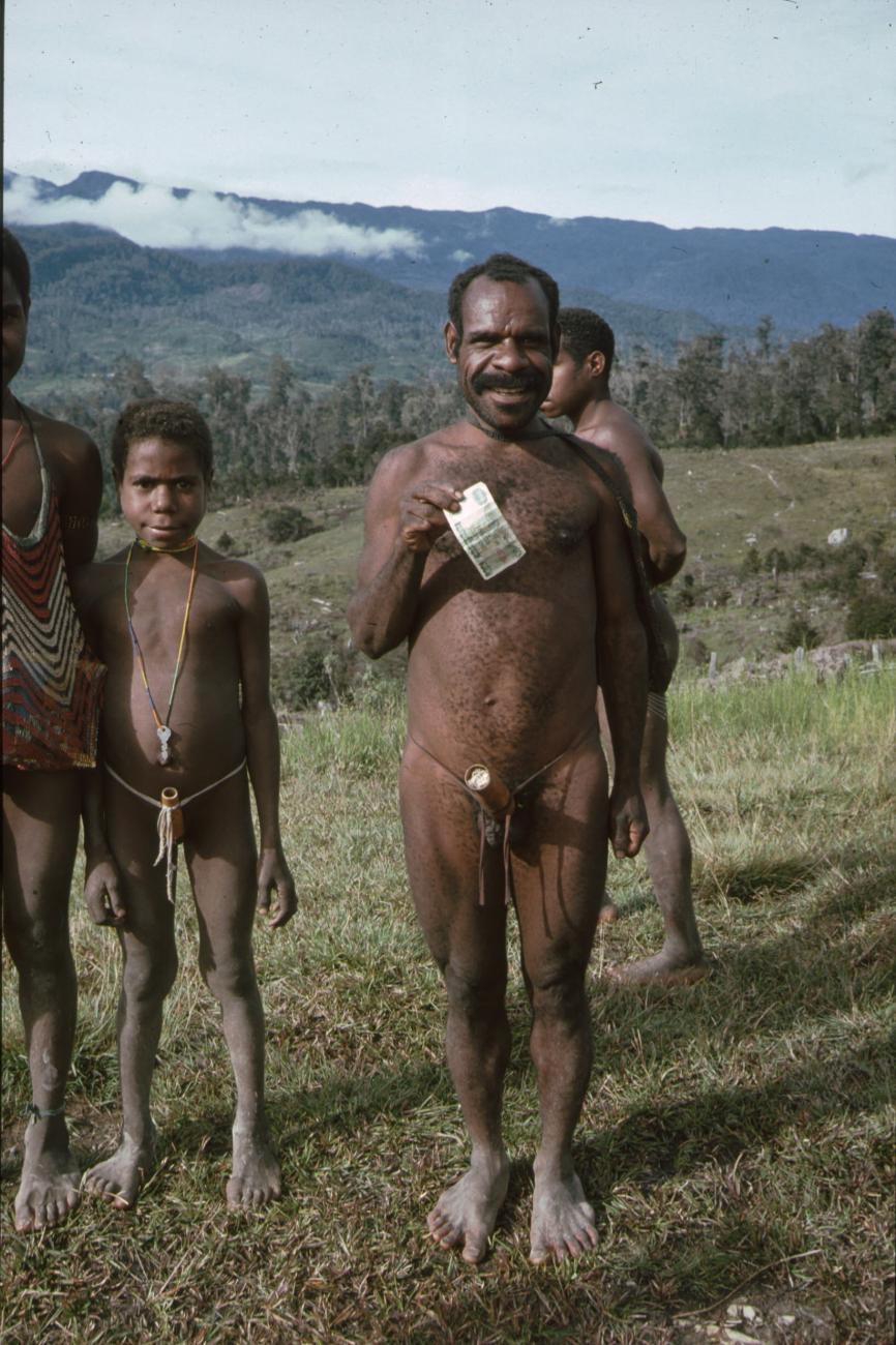 BD/166/329 -
Group of Papua men in the open field