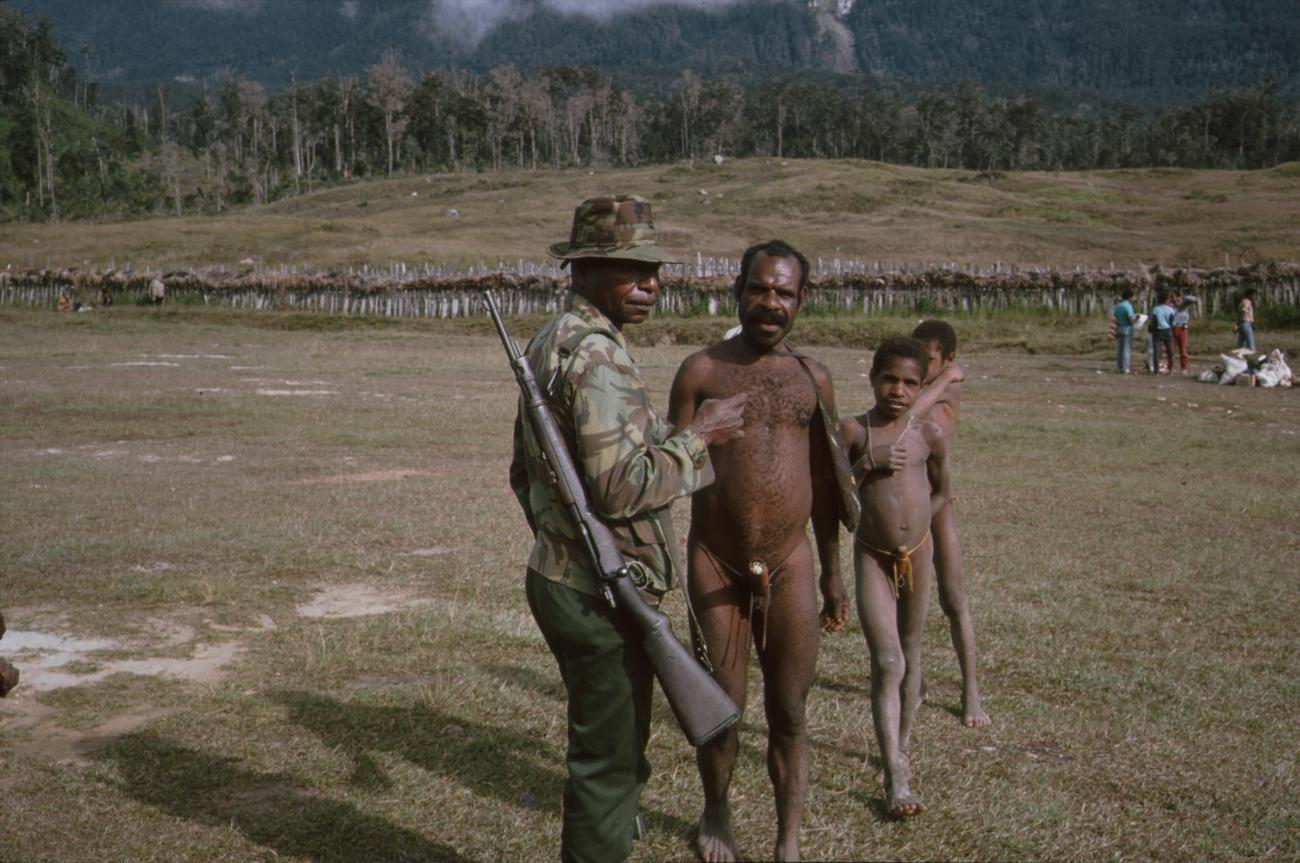 BD/166/329 -
Group of Papua men in the open field