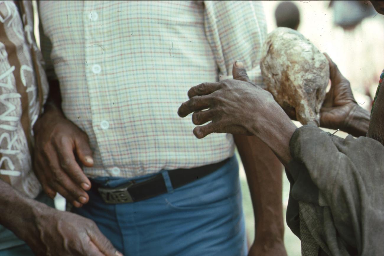 BD/166/337 -
Person with cassowary Skull in hand