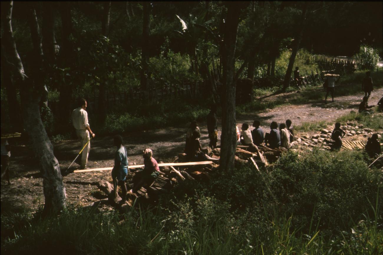 BD/166/91 -
Group of men resting in the forest