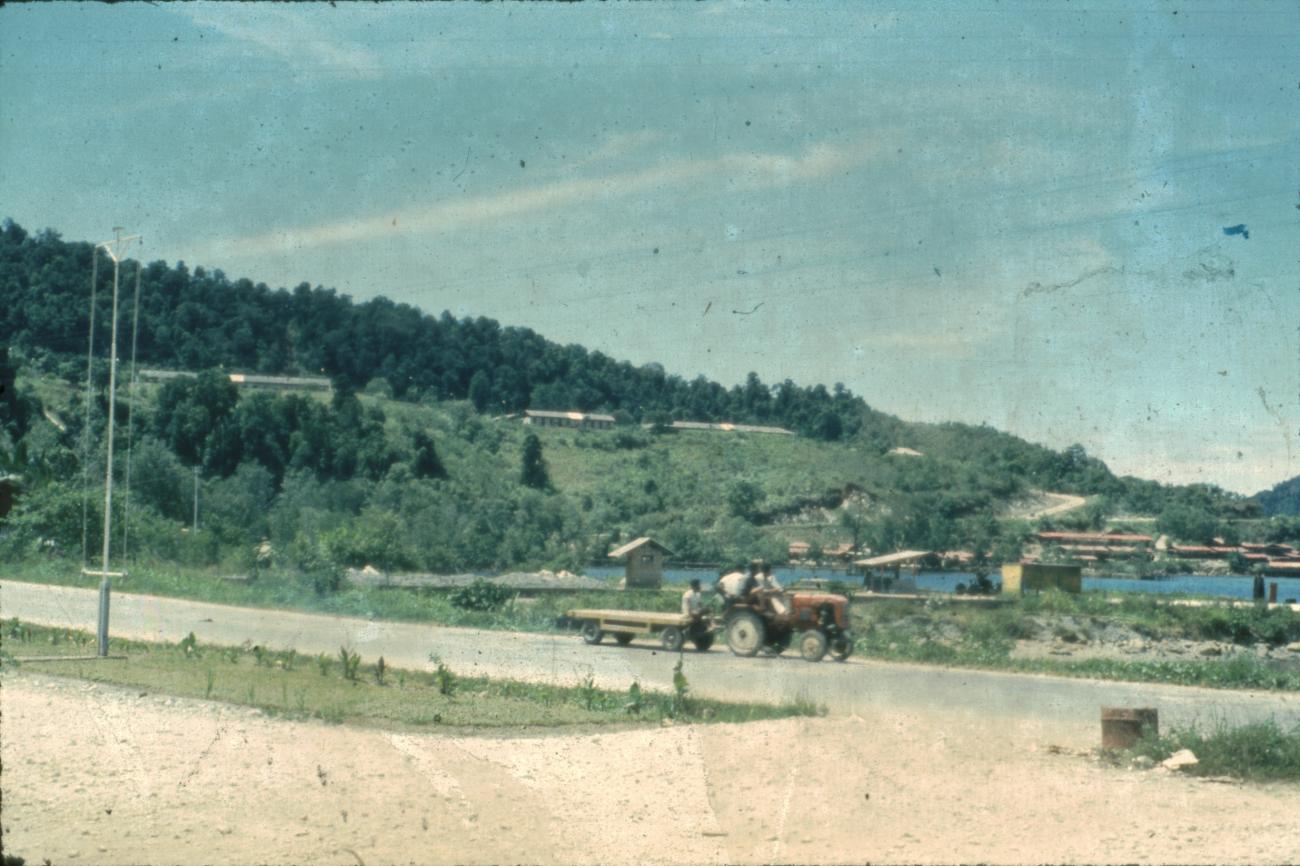 BD/67/155 - 
Tractor driving on the road
