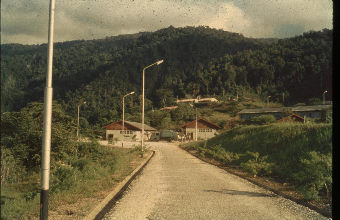 BD/67/180 - 
Road with houses up the slope
