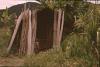 BD/132/66 kind met peniskoker voor houten hut