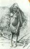 BD/40/48 Vrouwelijke Papoea met rokje, en hoofdbedekking